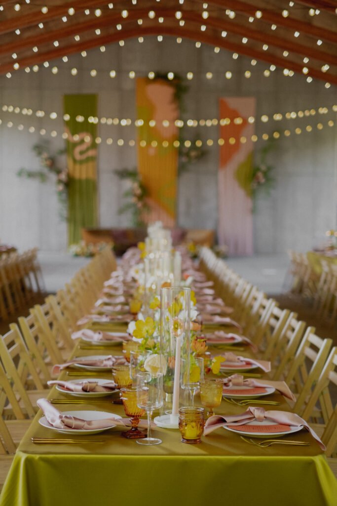 Long table with bright linens